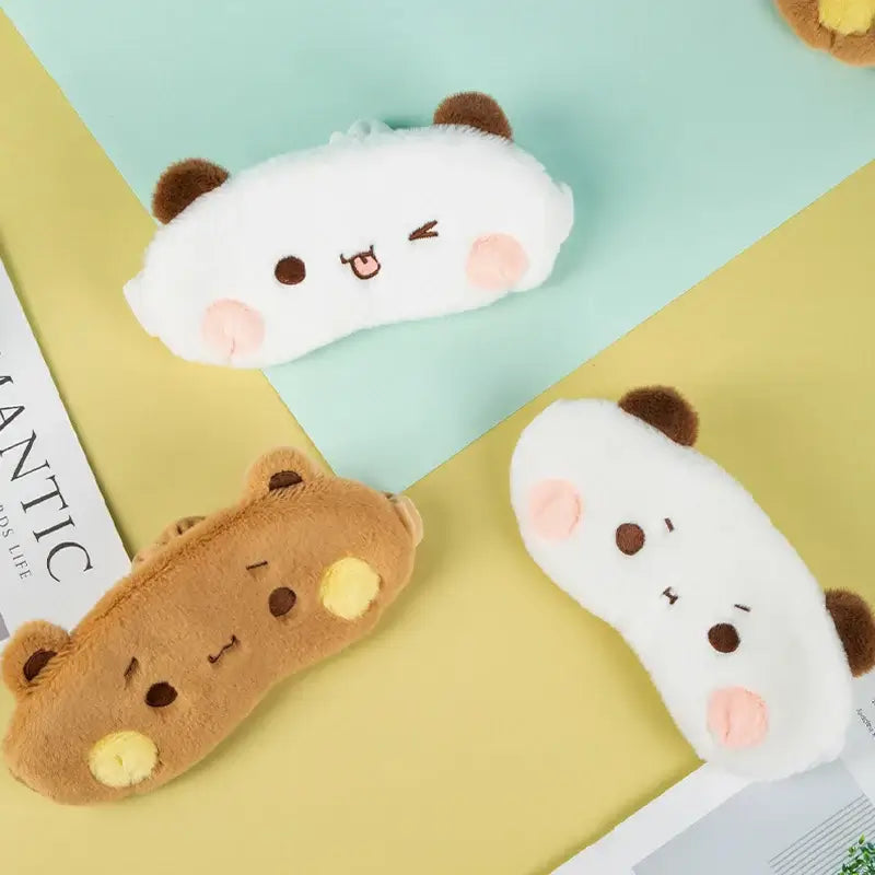Cute Bubu and Dudu eye covers in brown and white, perfect for comfortable sleep and style.