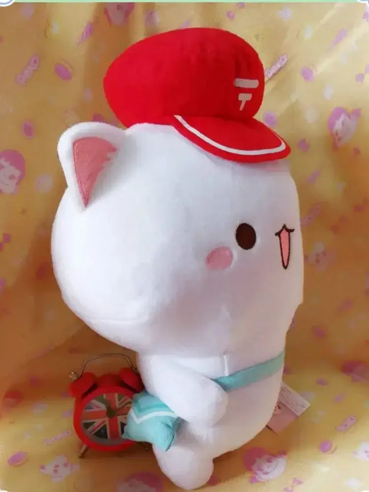Peach and Goma Cat Plushies.