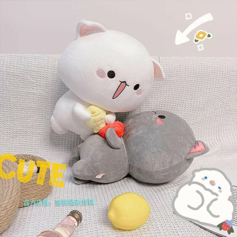 Peach & Goma Plushies.