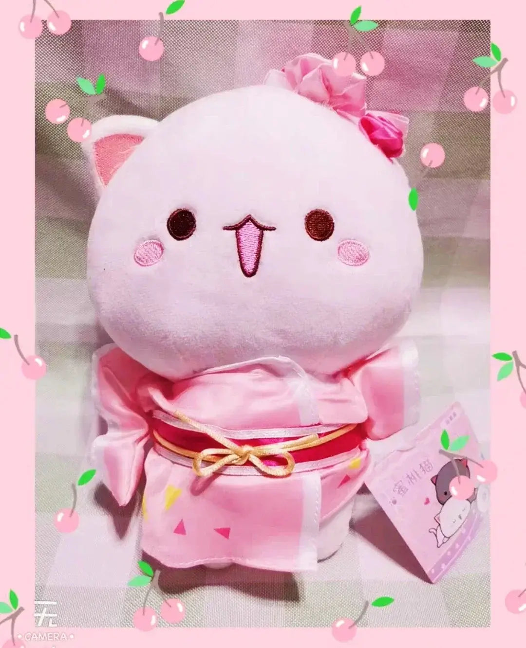 Peach and Goma Cat Plushies.