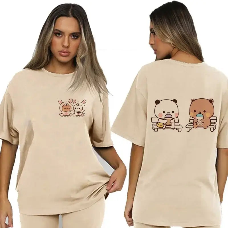 Bubu and Dudu T-shirt featuring cute bear and panda illustrations on a beige shirt.