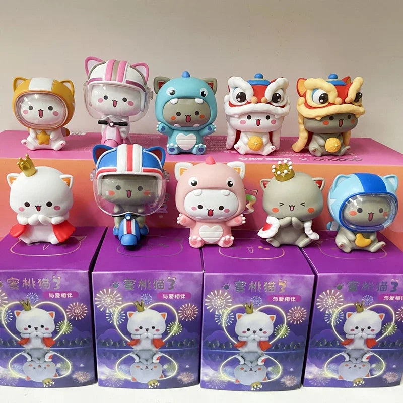 Peach And Goma Figurines.