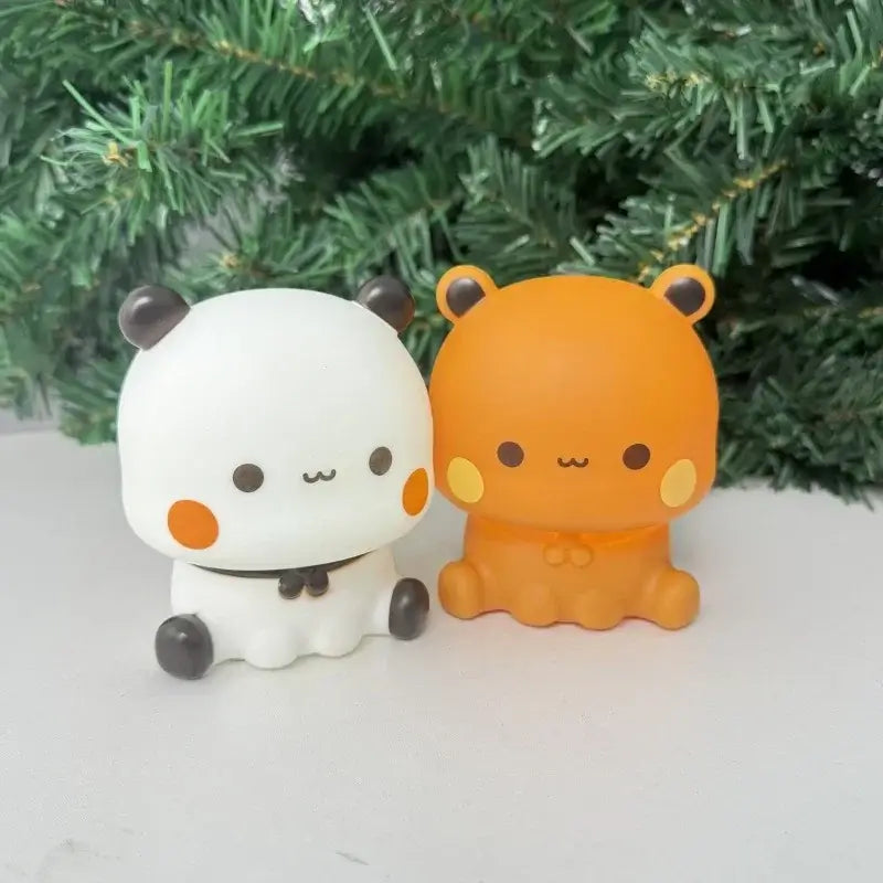 Bubu and Dudu lamp duo featuring a cute white bear and orange bear figurine, perfect for soft ambient lighting.