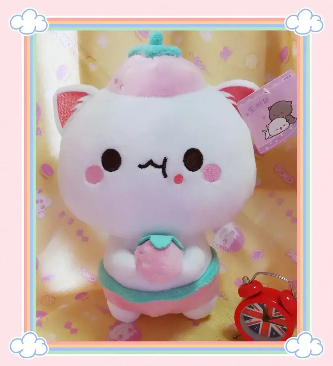 Peach and Goma Cat Plushies.