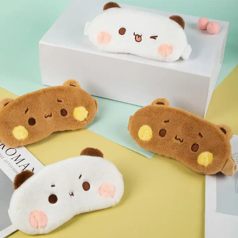 Adorable Bubu and Dudu eye covers displayed on a colorful background, perfect for comfort and style during sleep.