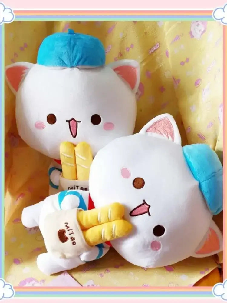 Peach and Goma Cat Plushies.