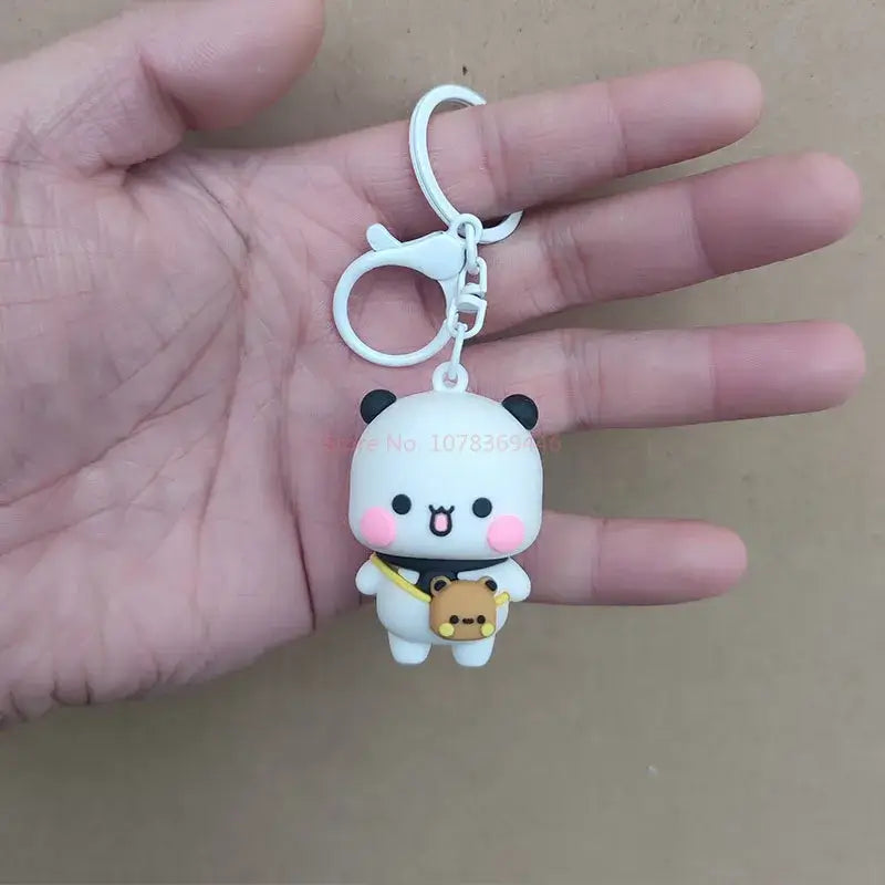 Cute panda keychain held in hand, perfect for expressing love and friendship.
