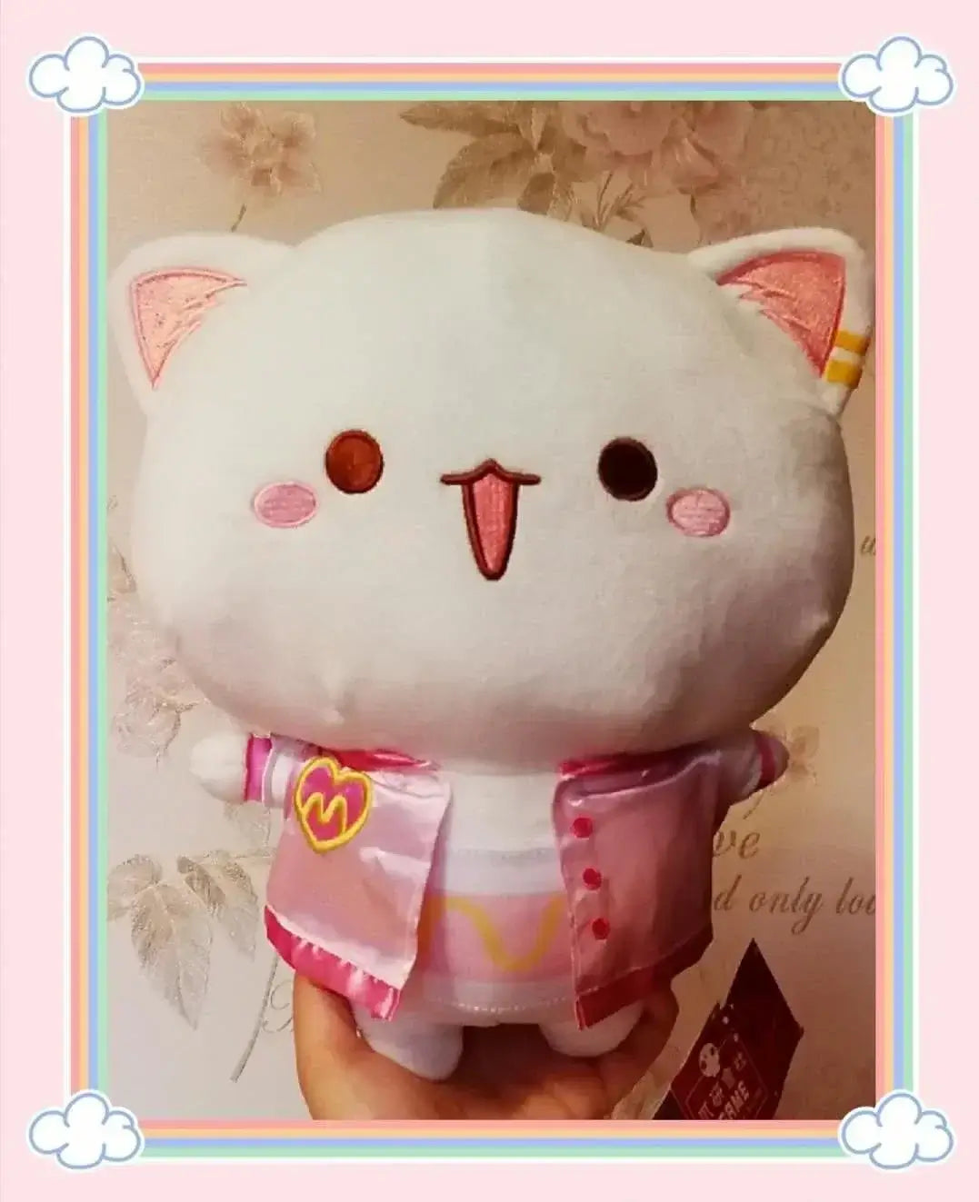 Peach and Goma Cat Plushies.