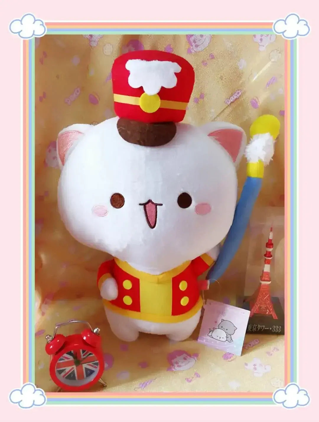 Peach and Goma Cat Plushies.
