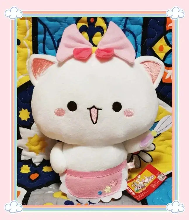 Peach and Goma Cat Plushies.