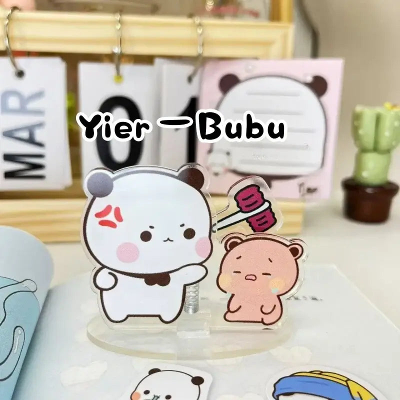 Cute Bubu and Dudu characters on a desk, perfect for an adorable desktop toy collection.