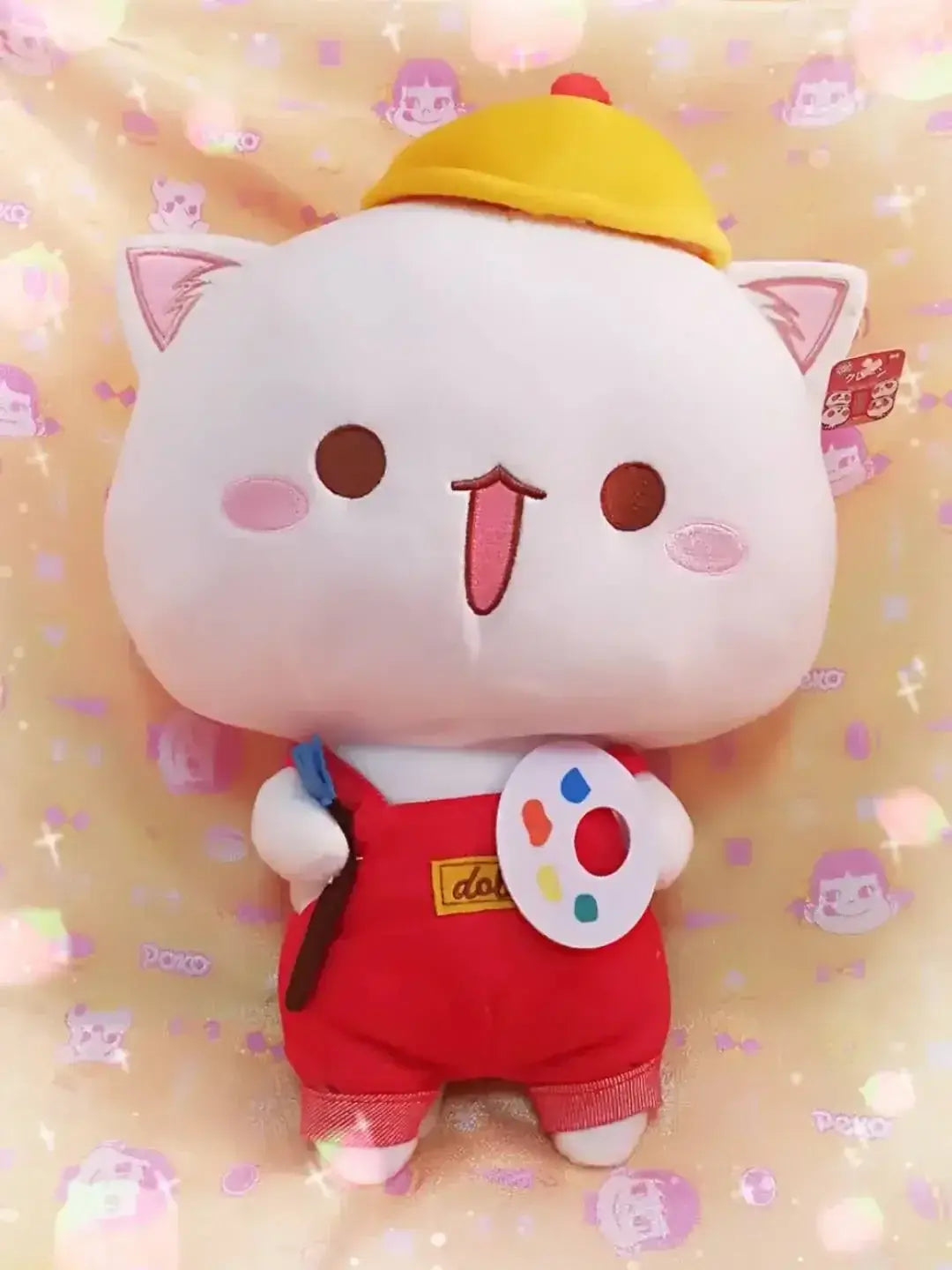 Peach and Goma Cat Plushies.