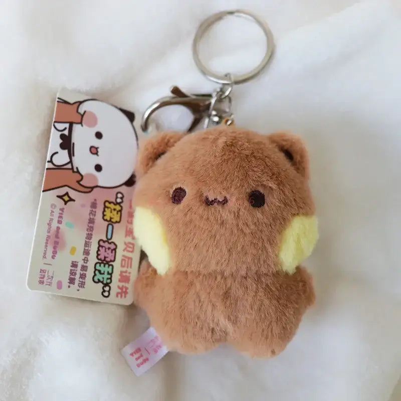 Cute Bubu and Dudu plush keychain featuring a soft brown bear design with a key ring attachment.