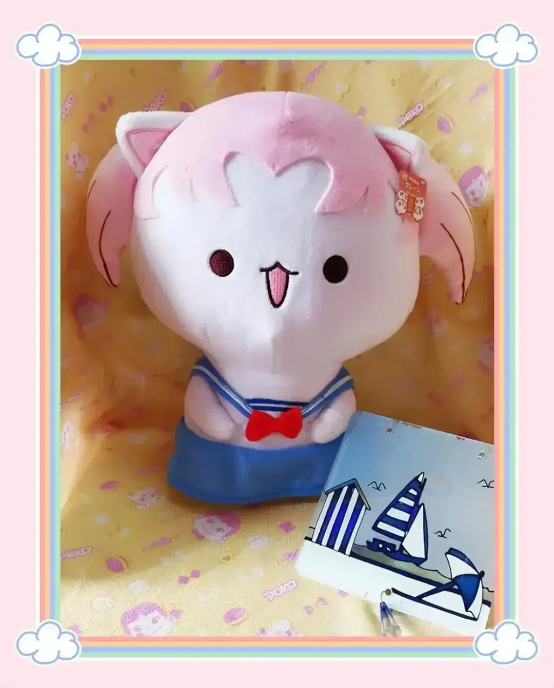 Peach and Goma Cat Plushies.