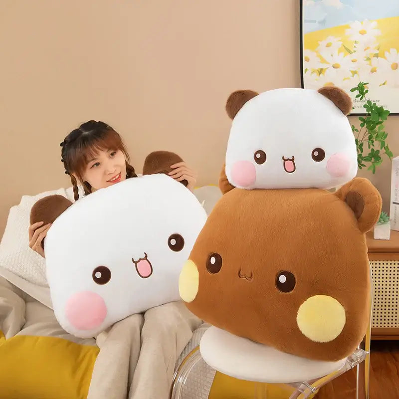 Smiling girl holding Bubu and Dudu plushie pillows, featuring bear and panda designs, for ultimate comfort.