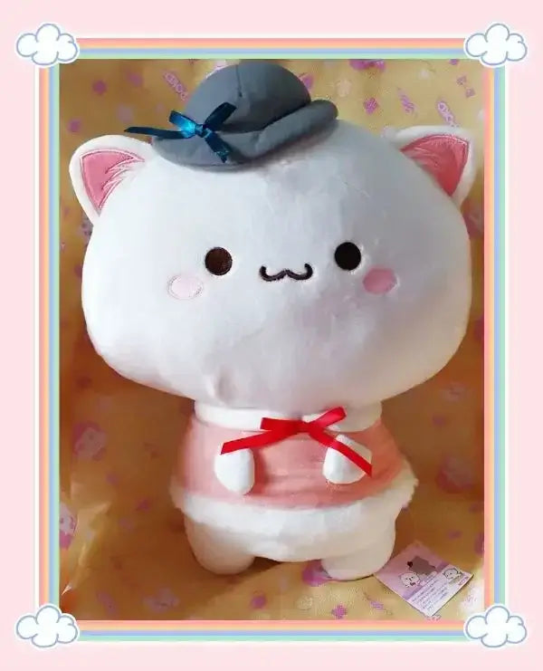Peach and Goma Cat Plushies.