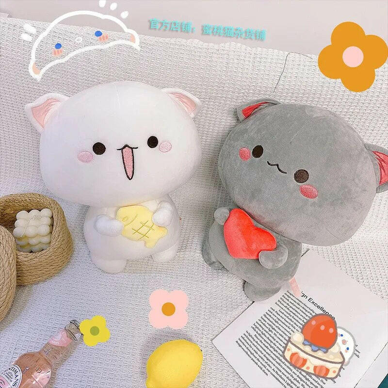 Peach & Goma Plushies.