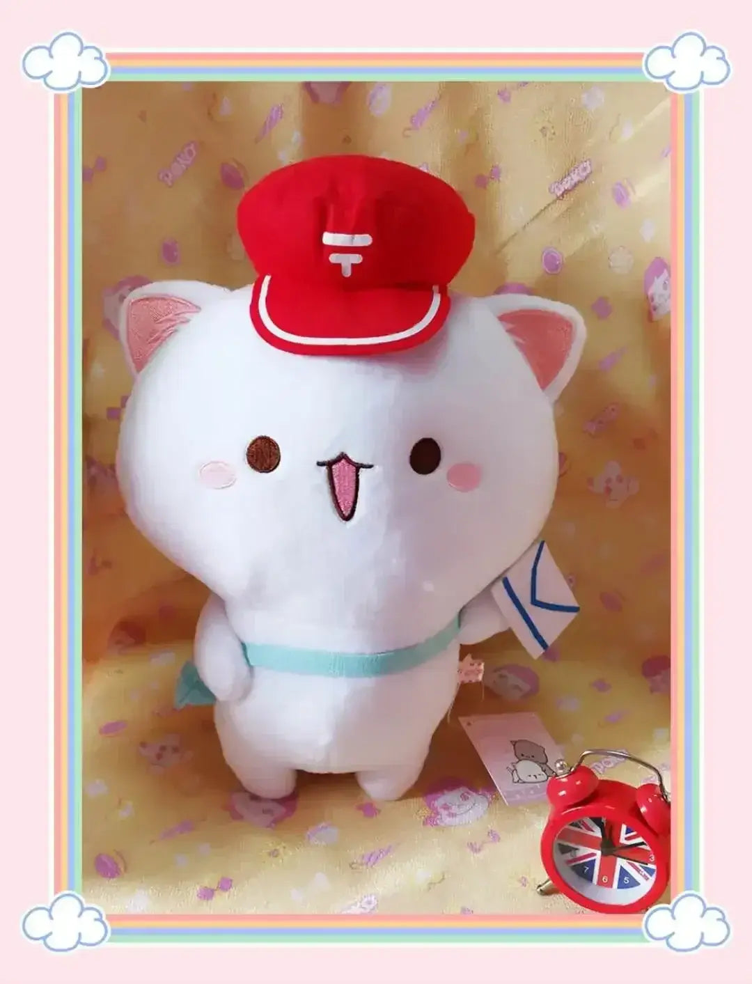 Peach and Goma Cat Plushies.
