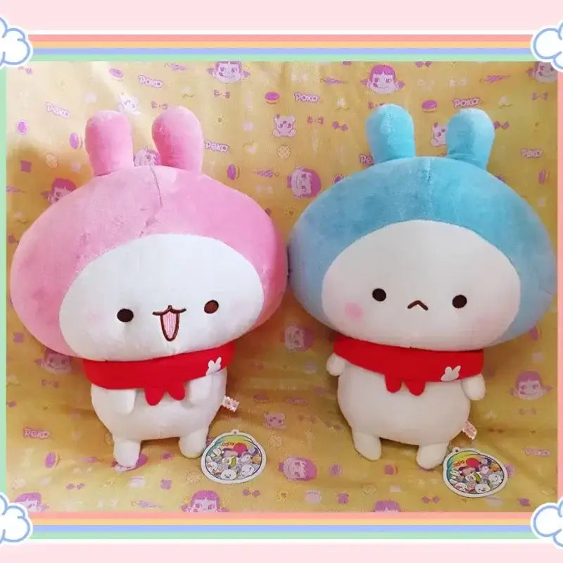 Peach and Goma Cat Plushies.