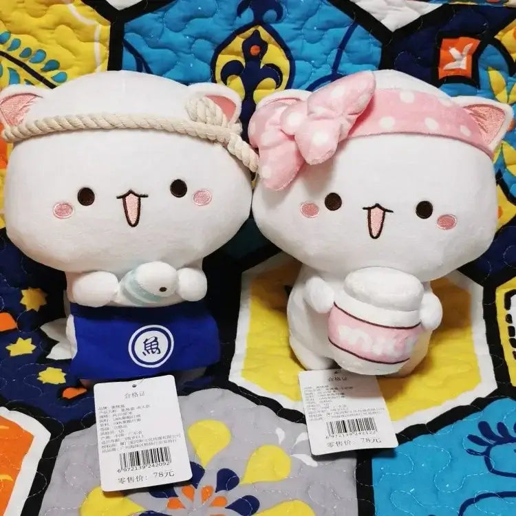 Peach and Goma Cat Plushies.