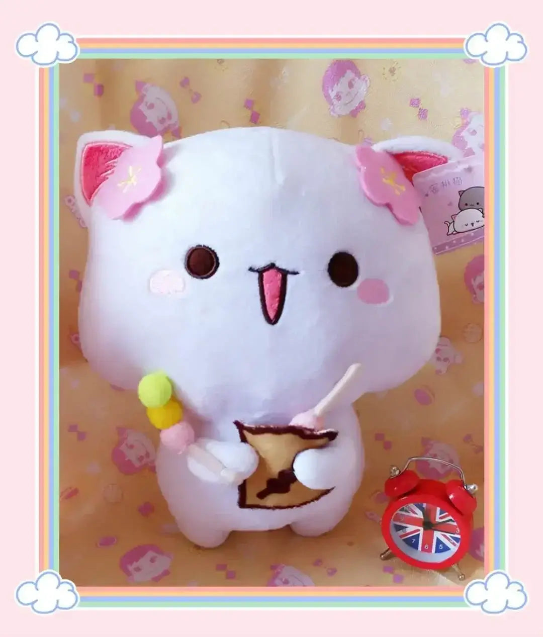 Peach and Goma Cat Plushies.