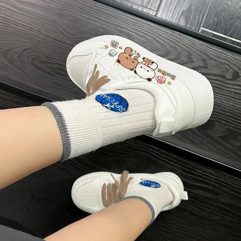 Close-up of cute Bubu and Dudu shoes with animal designs, paired with white socks, perfect for everyday wear.