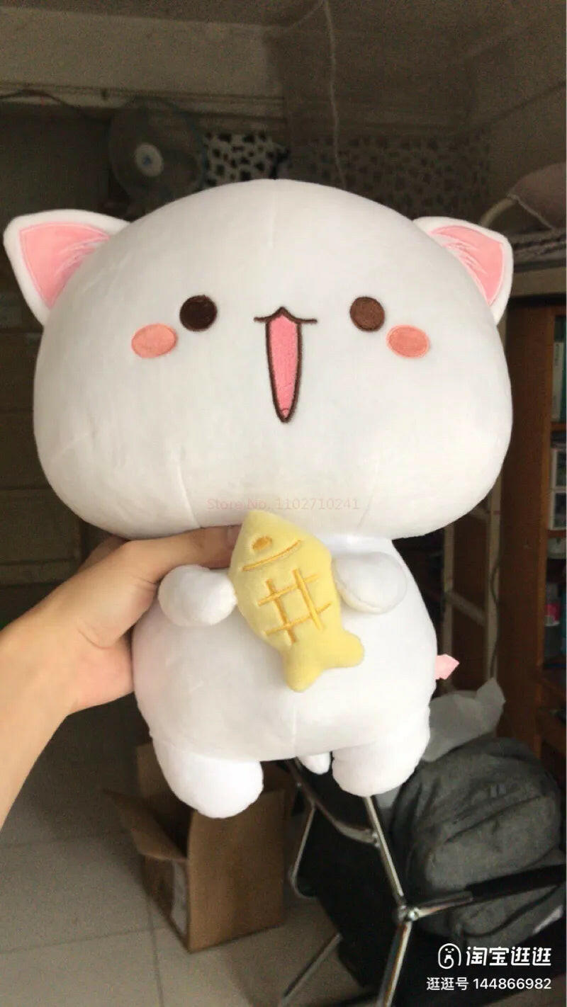 Peach & Goma Plushies.
