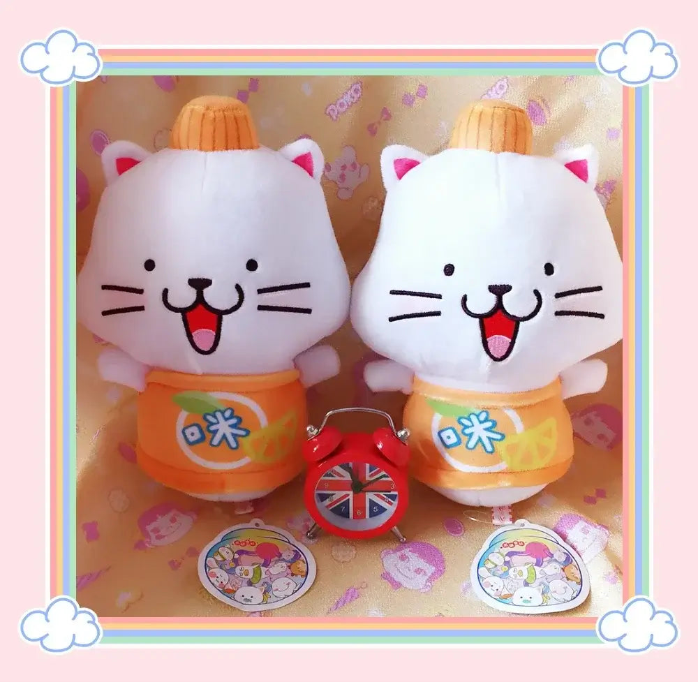 Peach and Goma Cat Plushies.